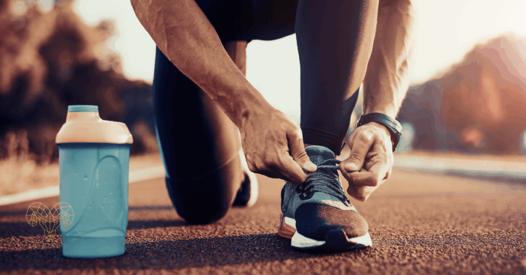 Close up of disciplined hands tying running shoes